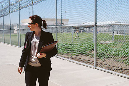 Anna Guy, attorney at Disability Rights Washington, stands outside of Stafford Creek Corrections Center during a monitoring visit.